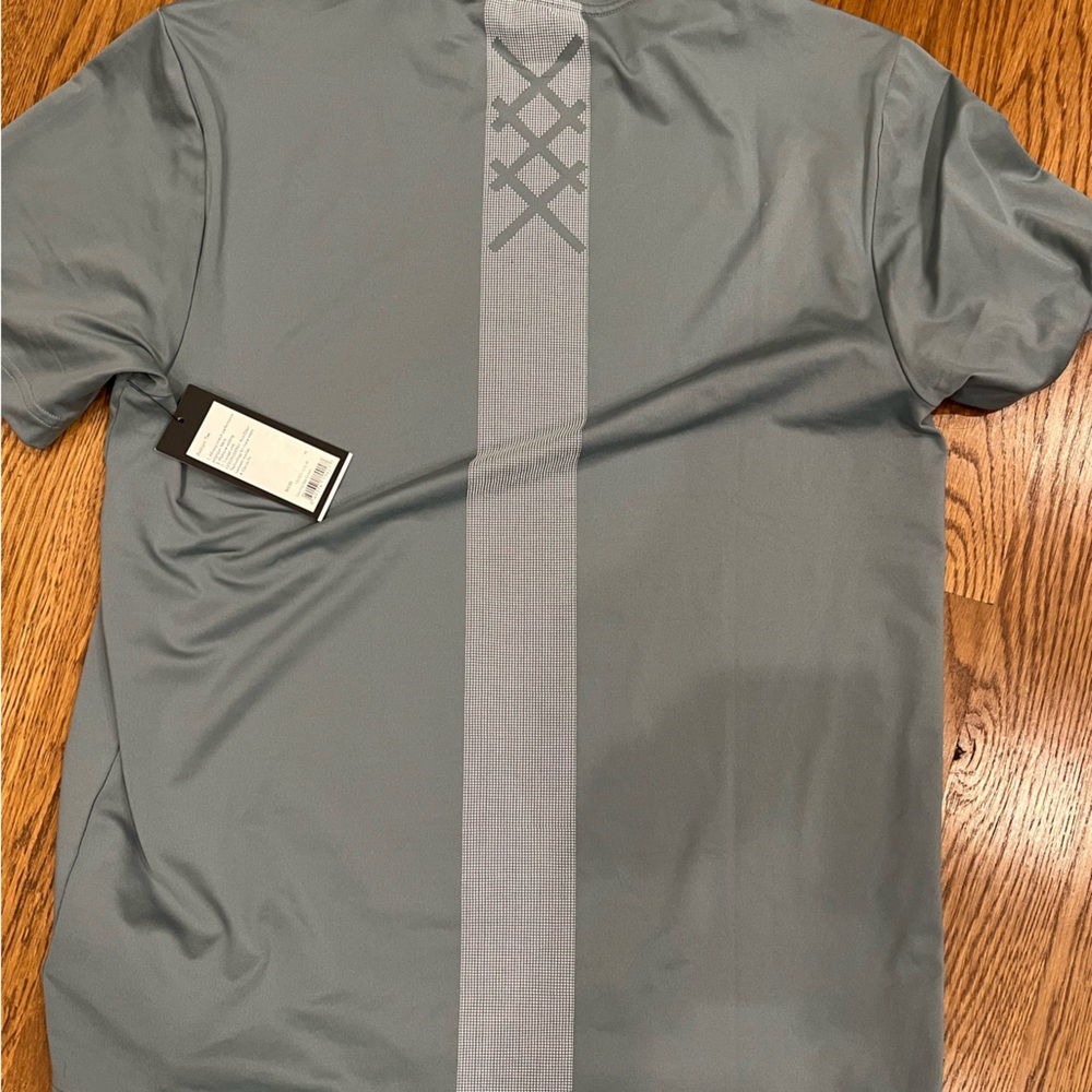 Rhône Backspin tee.  Front is plain- graphic on back.  Color: stormy sea green